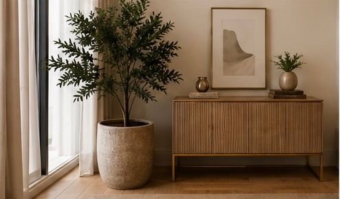 Stylish interior with artificial greenery and premium planter